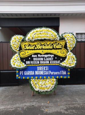 Papan Bunga Duka di Alasa Talumuzoi